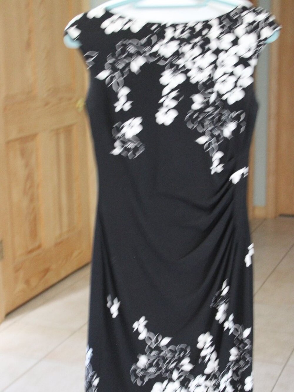 The product is a Ralph Lauren women's dress in black with a floral Ruched